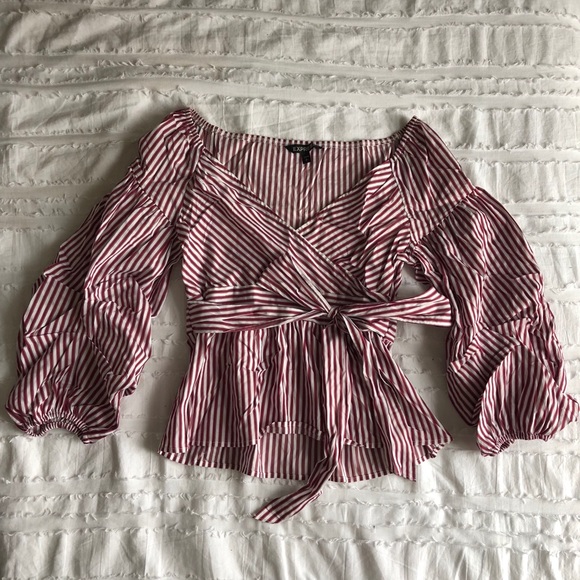 Cross body blouse with bow tie detail. NWOT - Picture 2 of 3